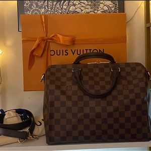 Louis Vuitton bandolier 30